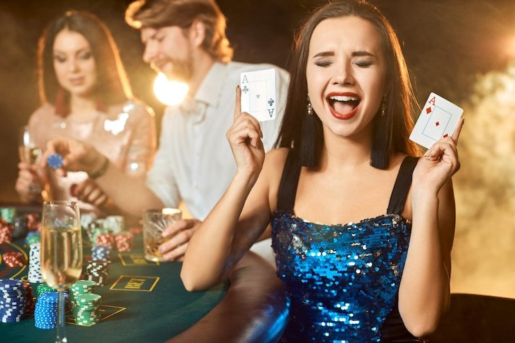 betogel login live dealer table broadcasting from multi-camera studio with dealers and roulette wheel